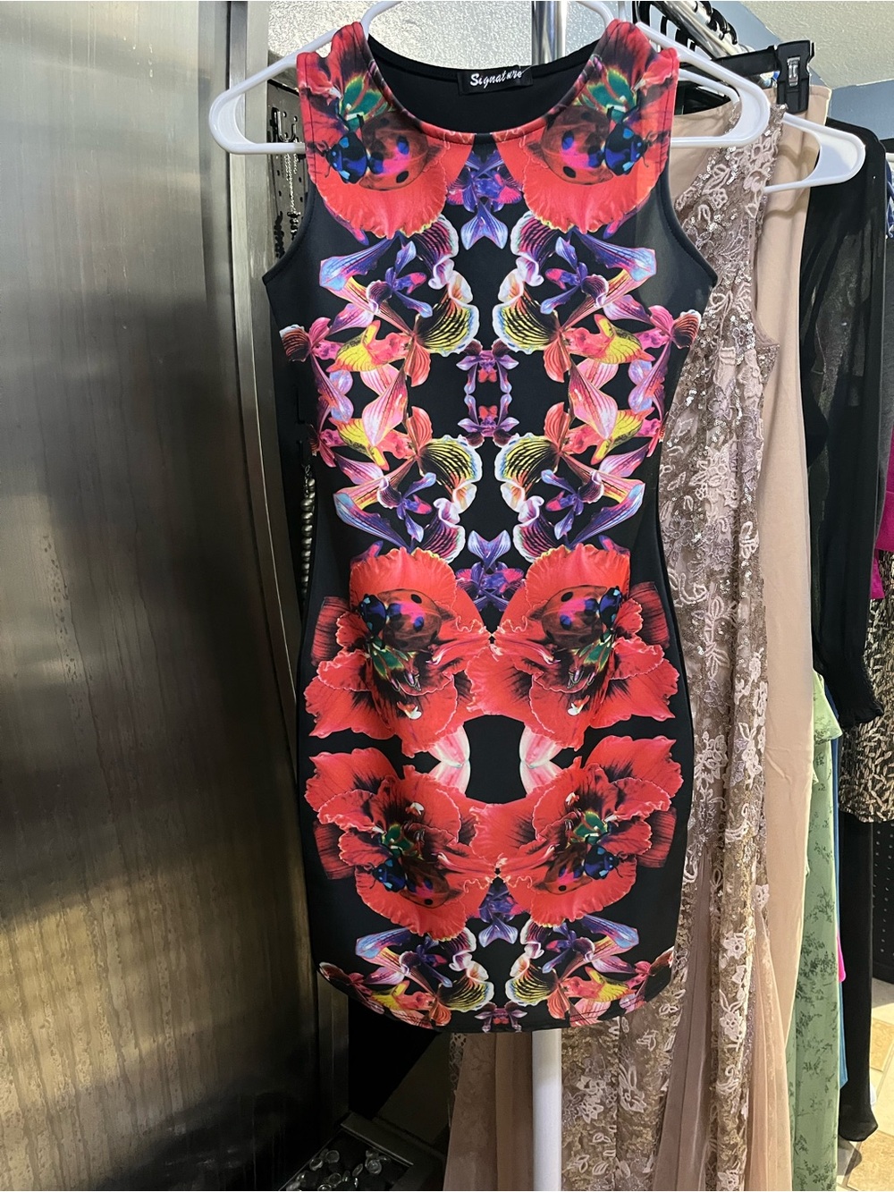Signature Black Mini Dress with Bold Red Floral Print